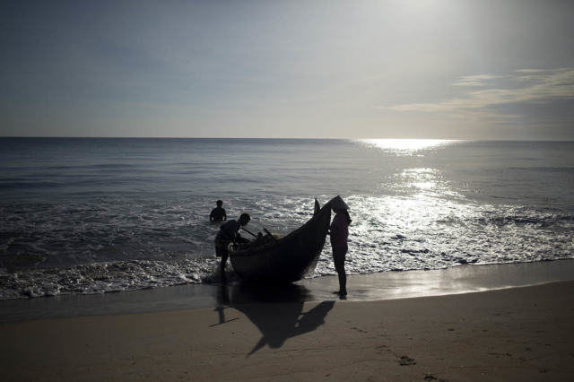 Fishermen Phu Tuan Beach Hue Vietnam